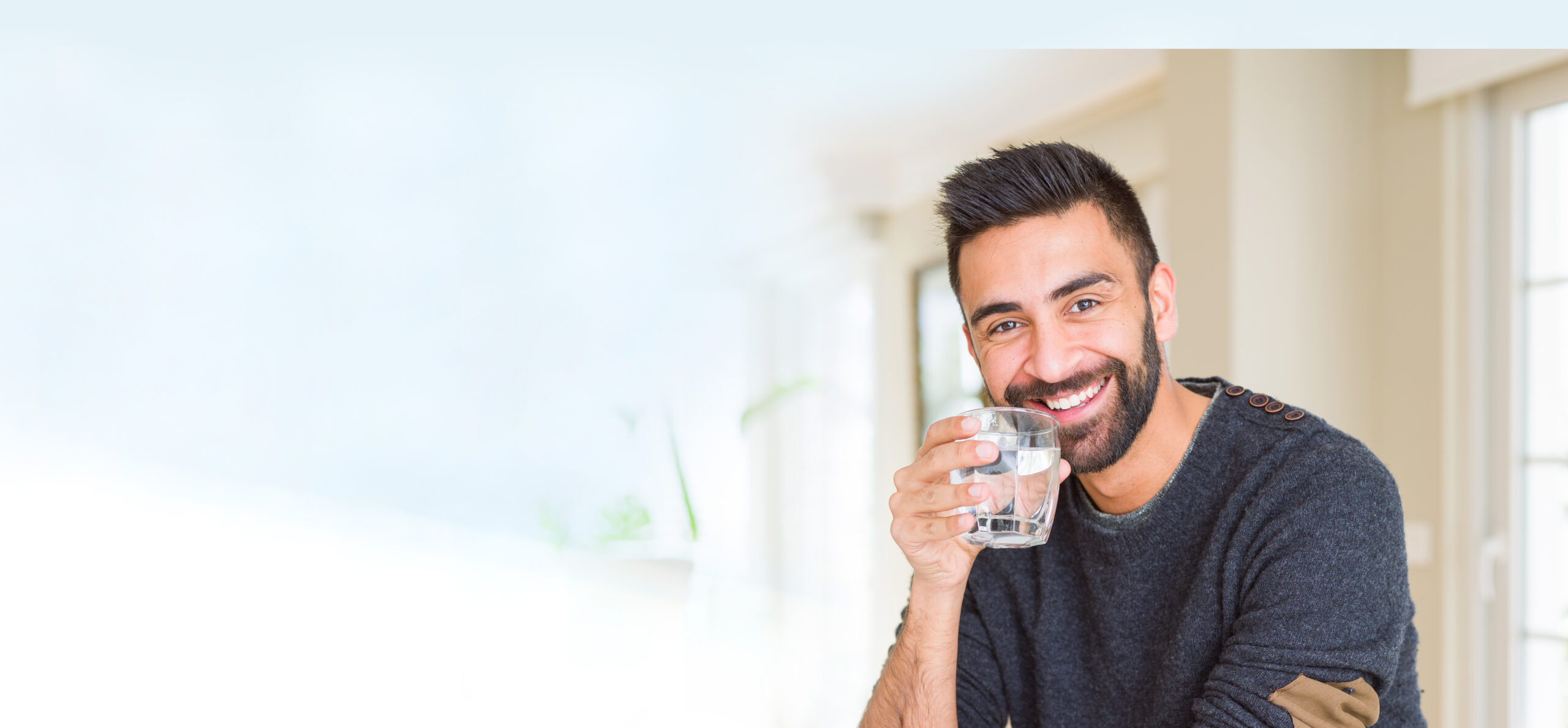 Guy drinking water